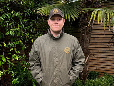 George, Director of Bee's Knees Gardening and Landscaping on site at a completed garden project.